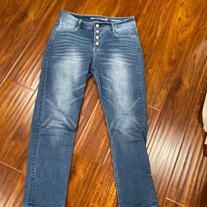 Dark wash pair of straight leg jeans